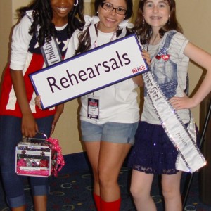 Pre-teens Hailey Kilgore and Kyra Walters pose with coreographer Leslie DelGadillo after their "patriotic" rehearsal!
