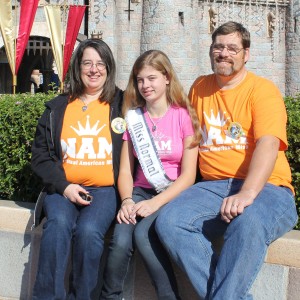 Rachel Marx (preteen, Leadership) with Mom and Dad in their NAM Team Leadership colors