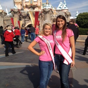 Team Achievement Miss in front of the Disney Castle
