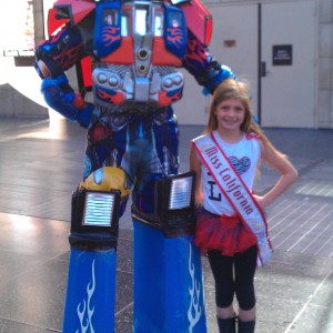 Miss California with a transformer on the Hollywood Tour