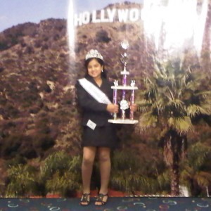 Holding the National Cover Girl trophy 