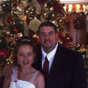 Paige Romero with Dad in front of Tree 