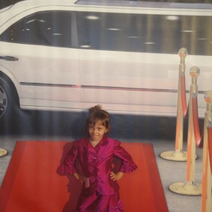 Miss Arizona Gabriela Bustillos in front of the limo backdrop.