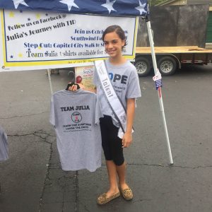 IL All-American Pre-Teen Livia Nieves Sells T-shirts at the local Fall Festival