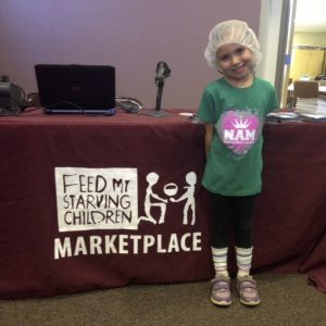 National American Miss Finalist, Alena Mascarena from Arizona volunteers with Feed My Starving Children
